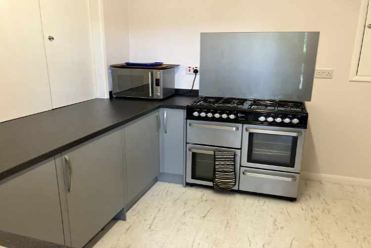 Kitchen with large range of appliances