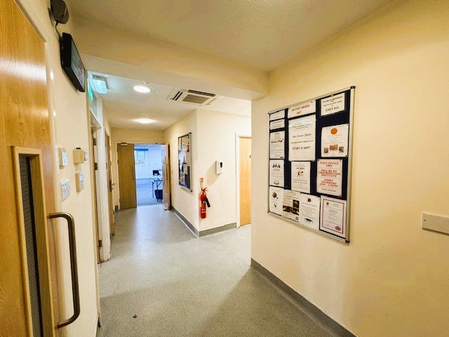 Corridor with store room & toilets