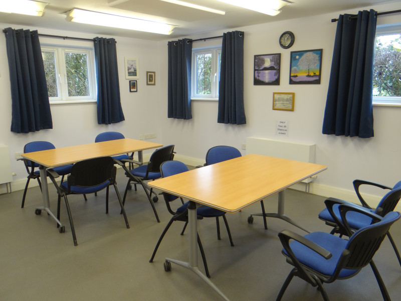 Mitchell Room with 4 tables and 20 chairs