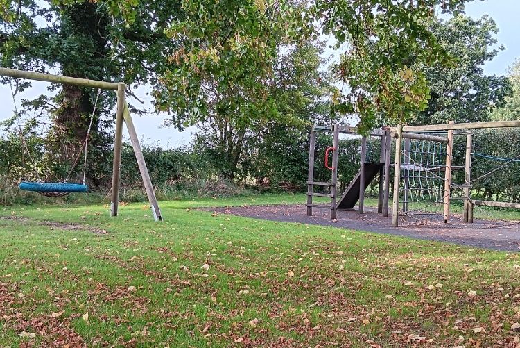 Park at the back of the hall