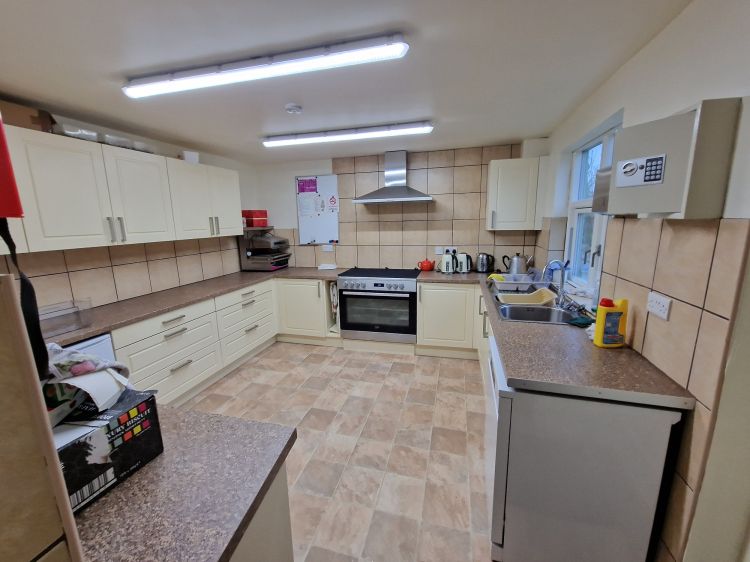 Kitchen with a large range of appliances