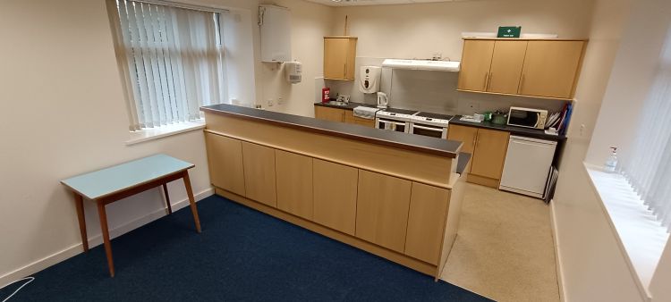 Kitchen with range of appliances