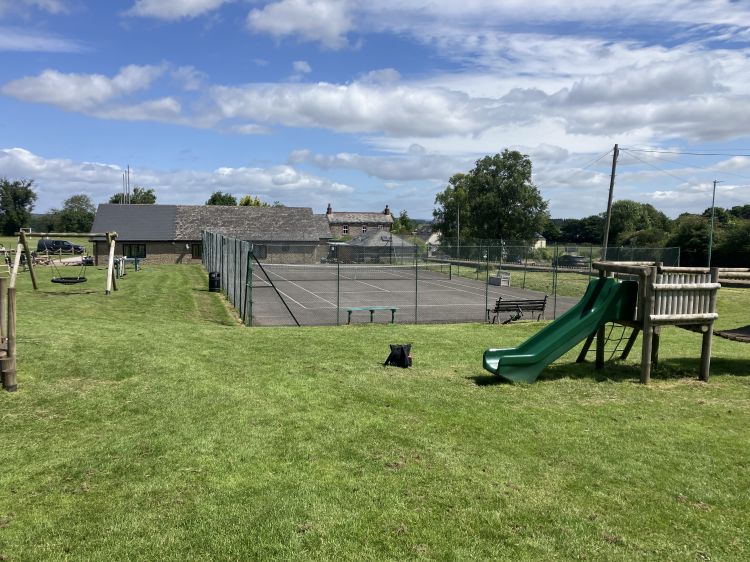Tennis court with all weather surface