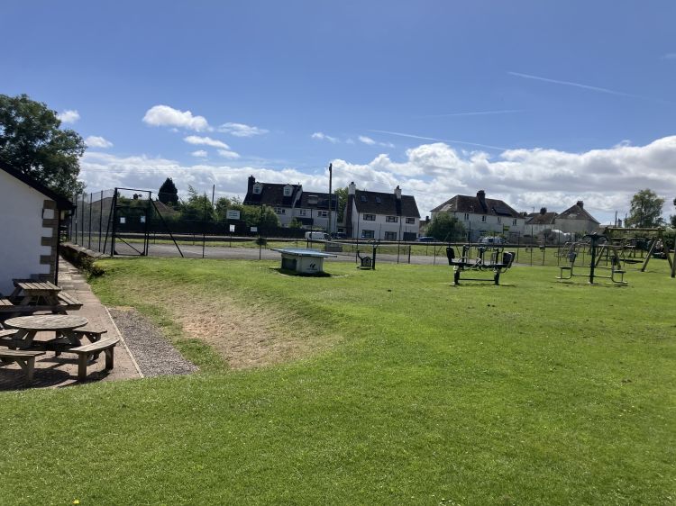 Tennis court and play equipment