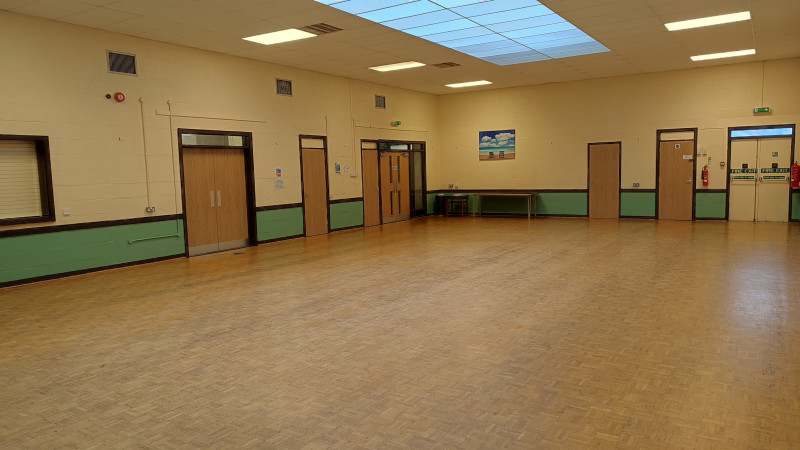 Main Hall - Seating up to 100, tables and chairs included.
