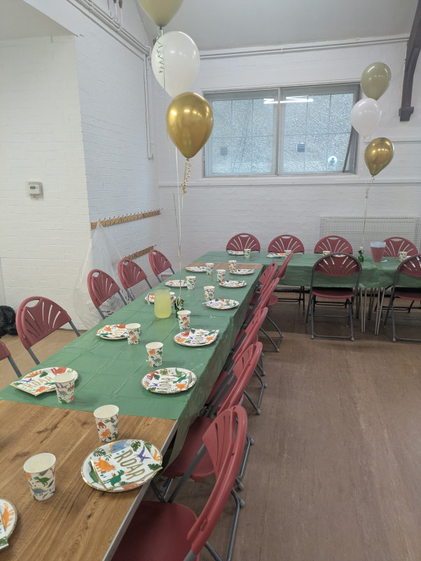 One end of the hall, nearest to the kitchen