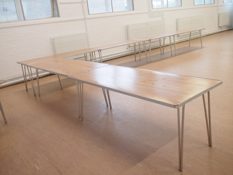 Hall, some tables laid out.