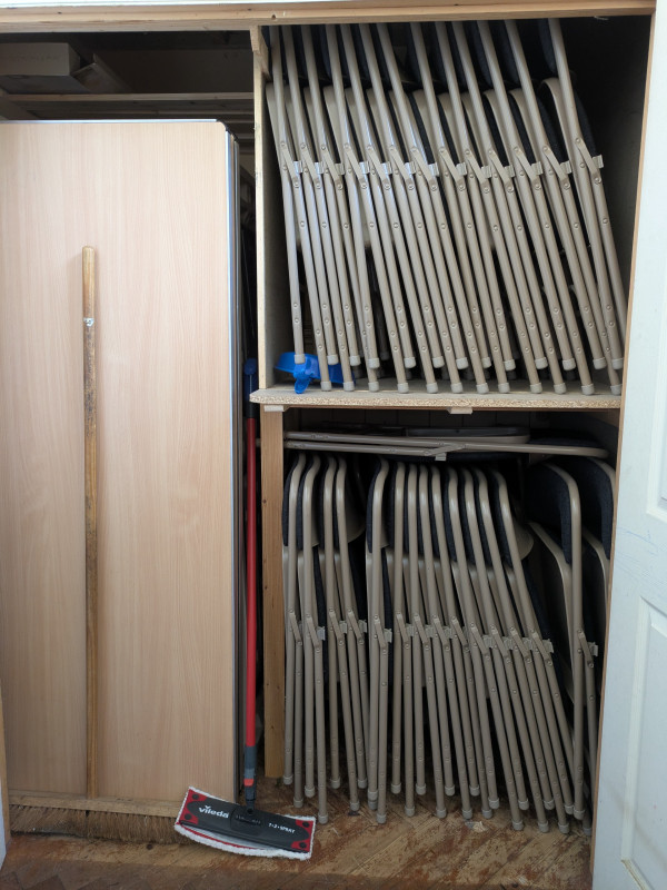 Chairs stored in Ante Room cupboard