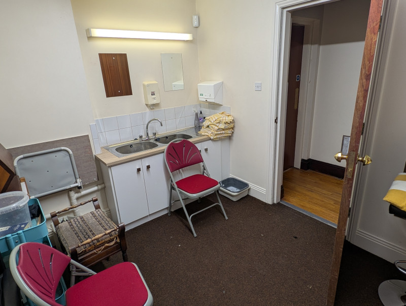 Backstage Green Room with toilet.